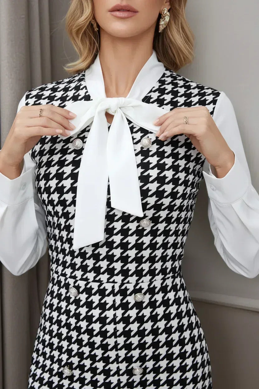 Close-up of houndstooth dress tie neck bow detail - elegant fashion photography